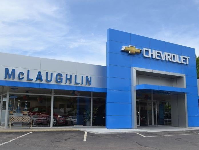 The front view of the McLaughlin Chevrolet building in Whitman, MA
